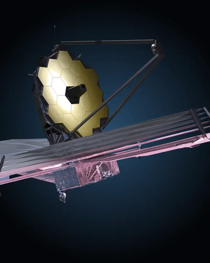 El telescopio espacial James Webb representado sobre el azul profundo del espacio