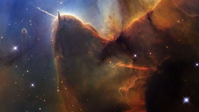 Hubble's 36th anniversary Wide Field Camera 3 image of the Trifid Nebula showing dust, gas, and the Herbig-Haro 399 protostar jet in a 5,000-light-year-distant star-forming region in Sagittarius.