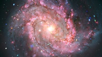 Composite image of galaxy Messier 83 combining Chandra X-rays with Hubble optical light, showing variable supernova remnants.