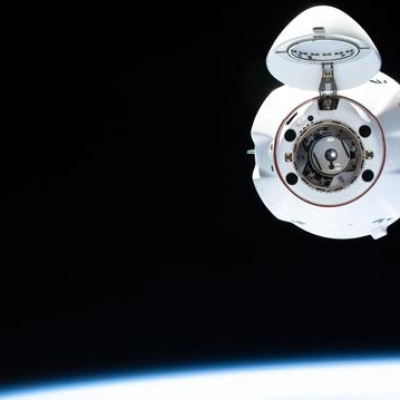 A SpaceX Dragon cargo spacecraft approaches the International Space Station