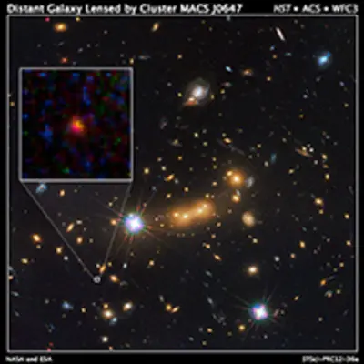 Distant Galaxy Lensed by Cluster MACS J0647