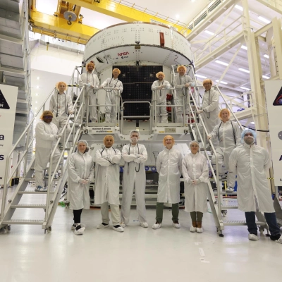 NASA and its partners work on the solar array wings for the agency’s Artemis III Orion spacecraft on Thursday, April...