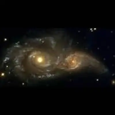 A Grazing Encounter Between Two Spiral Galaxies (NGC 2207 and IC2163)