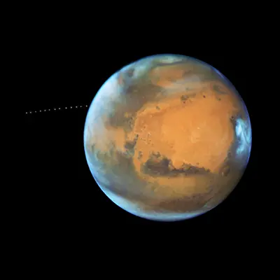 NASA’s Hubble Sees Martian Moon Orbiting the Red Planet