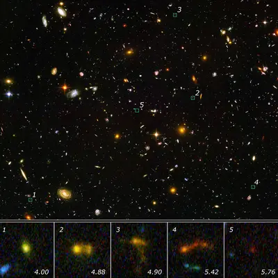 Hubble and Spitzer Uncover Smallest Galaxy Building Blocks