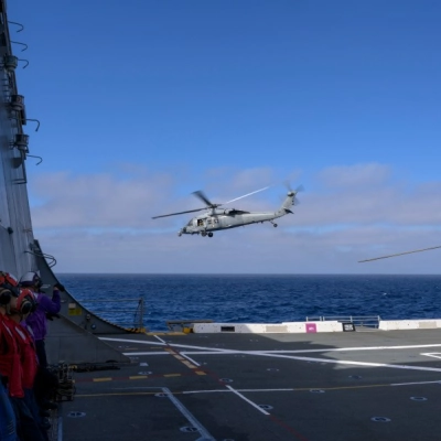 U.S. Navy MH-60 Seahawks from Helicopter Sea Combat Squadron (HSC) 23 depart USS John P. Murtha as they conduct air...