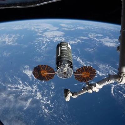 The Cygnus XL cargo spacecraft at its capture point 12 meters from the International Space Station
