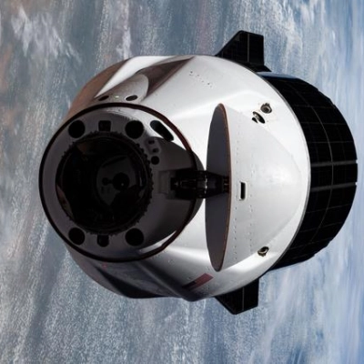 A SpaceX Dragon cargo spacecraft approaches the International Space Station