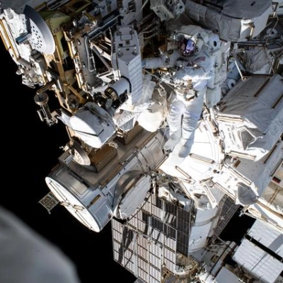 Astronaut Butch Wilmore works outside the International Space Station