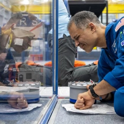 NASA astronaut Anil Menon participates in an emergency training session