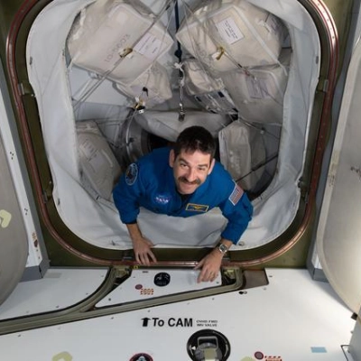 NASA astronaut Jack Hathaway enters the International Space Station