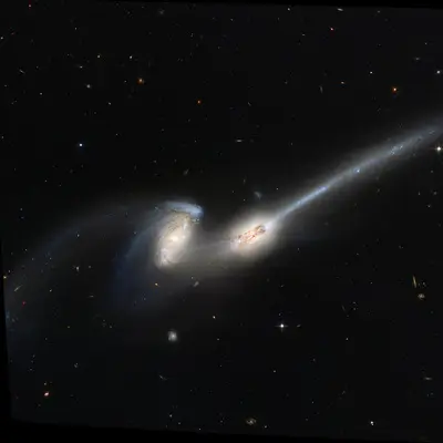 "The Mice" (NGC 4676): Colliding Galaxies Stream Stars and Gas