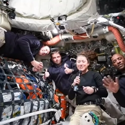 The Artemis II crew answers questions from reporters during the first downlink event of their mission.