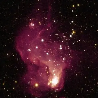 A Giant Star Factory in Neighboring Galaxy NGC 6822