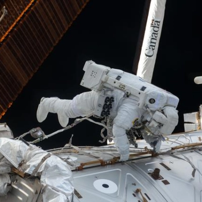 Astronaut Butch Wilmore works outside the International Space Station