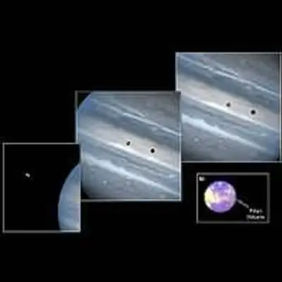 Jupiter's Moon, Io, Sweeps Across the Planet; Io Volcano Spews Sulfur Dioxide Snow (lower right)