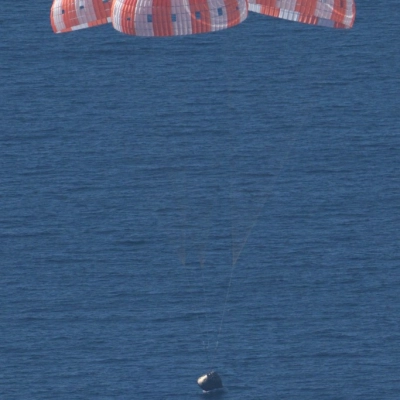 NASA's Orion spacecraft carrying Artemis II Commander Reid Wiseman, Pilot Victor Glover, and Mission Specialist Christina Koch from NASA, along...