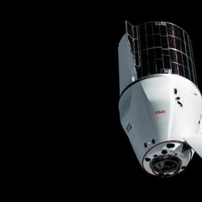 The SpaceX Dragon cargo craft approaches the International Space Station