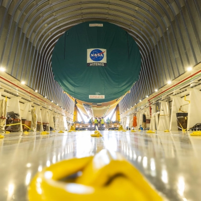NASA’s top four-fifths of the SLS (Space Launch System) core stage for the Artemis III mission is offloaded from the...