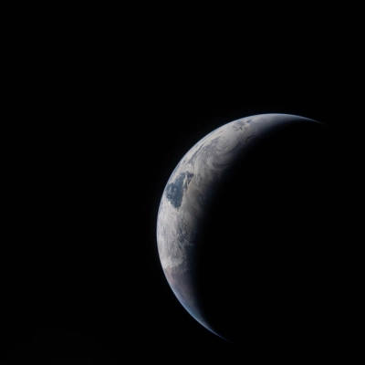 art002e024014 (April 4, 2026) - A thin arc glowing in the darkness of space. Sunlight traces the curves of the...