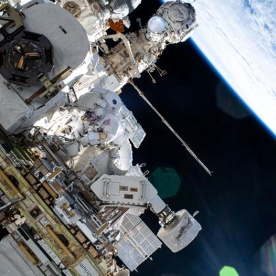 Astronaut Butch Wilmore works outside the International Space Station