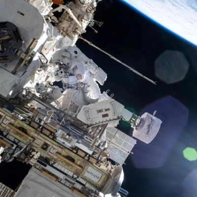 Astronaut Butch Wilmore works outside the International Space Station