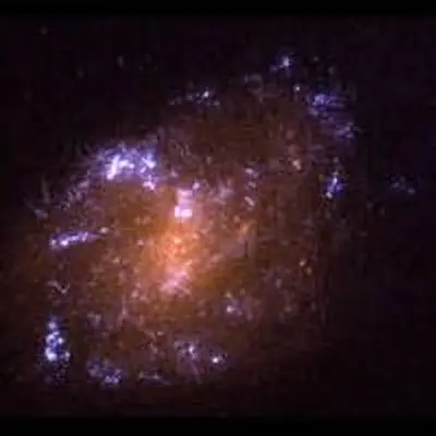 A Tiny, Youthful Spiral Galaxy, ESO 418-008