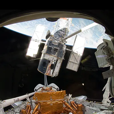 Lifting Hubble from Atlantis' Cargo Bay (2009)