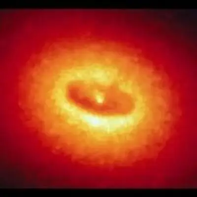 Giant Disk of Cold Gas and Dust Fuels Possible Black Hole at the Core of NGC 4261