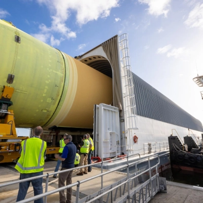 NASA’s top four-fifths of the SLS (Space Launch System) core stage for the Artemis III mission is offloaded from the...