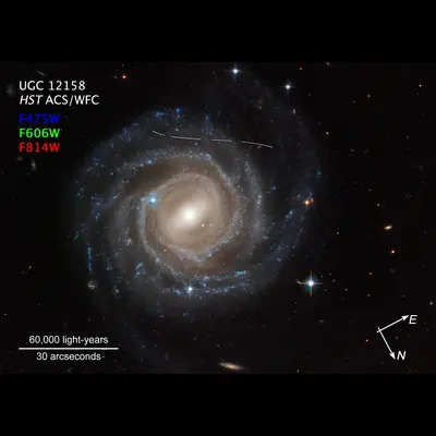 Asteroid Passes in Front of UGC 12158 (Compass Image)