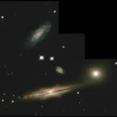 Hickson Compact Group 87: A Minuet of Four Galaxies
