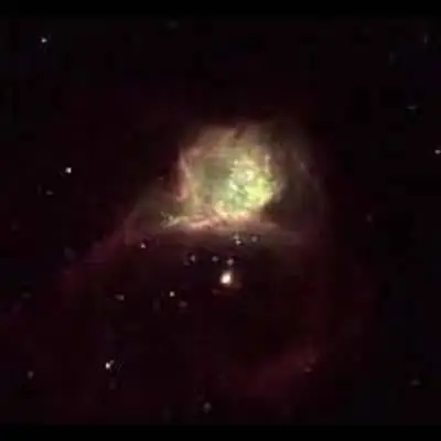 Hubble X: A Glowing Gas Cloud in the Star-Forming Region of Galaxy NGC 6822