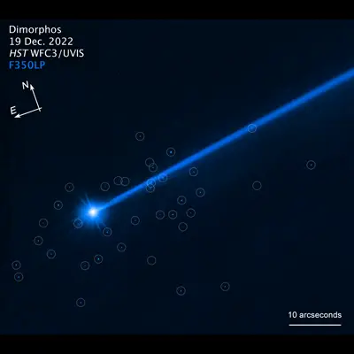 Hubble Photographs Boulders Flung Off Asteroid Dimorphos (Compass Image)