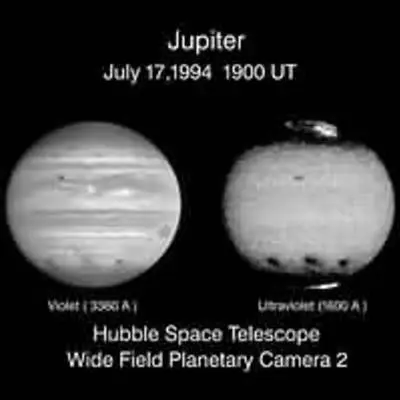 Jupiter's Comet Collision Sites As Seen in Visible and Ultraviolet Light