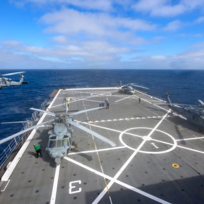U.S. Navy MH-60 Seahawks from Helicopter Sea Combat Squadron (HSC) 23 on USS John P. Murtha prepare to conduct air...