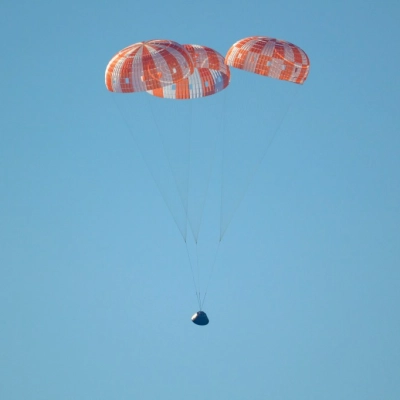 NASA’s Orion spacecraft with Artemis II crewmembers NASA astronauts Reid Wiseman, commander; Victor Glover, pilot; Christina Koch, mission specialist; and...