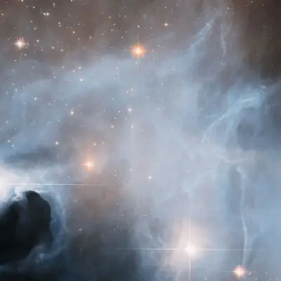 Hubble Observes Ghostly Cloud Alive with Star Formation