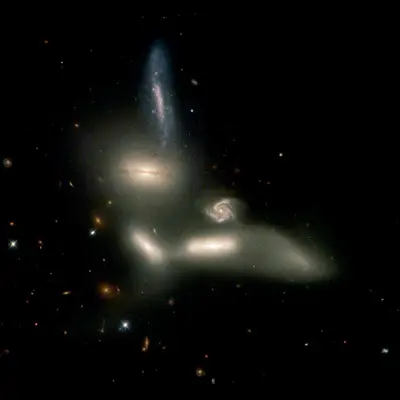 Seyfert's Sextet: Four Colliding Galaxies, and Two Bystanders