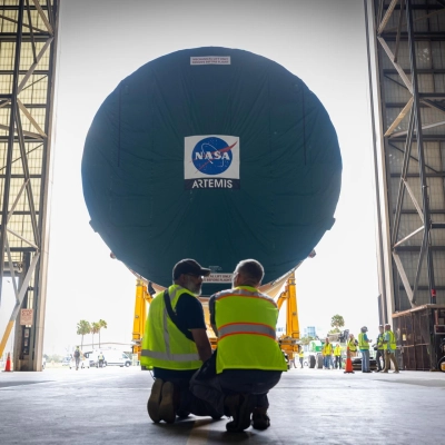 NASA’s top four-fifths of the SLS (Space Launch System) core stage for the Artemis III mission arrives in the transfer...
