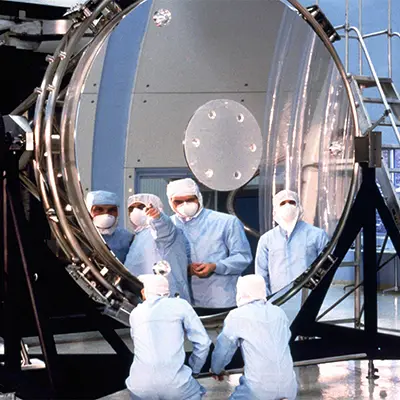 Working on Hubble's Main Mirror (1990)