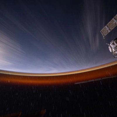 The International Space Station soars above the Pacific Ocean