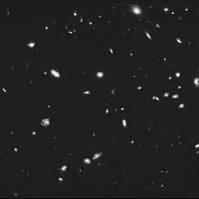 A Cluster of Galaxies Four Billion Light-years Away