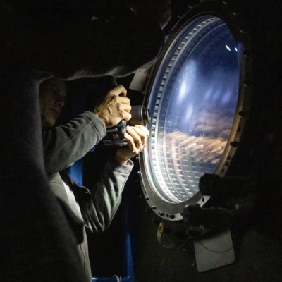 NASA astronaut Anil Menon participates in a photography training session