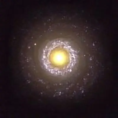 Black Hole-Powered Spiral Galaxy NGC 7742