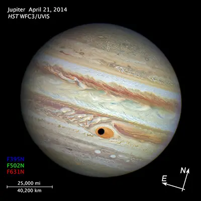 Compass and Scale Image for Jupiter's Great Red Spot and Ganymede's Shadow