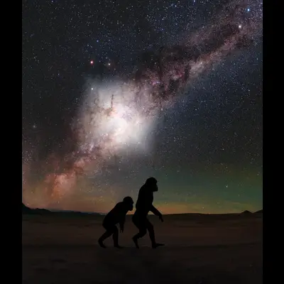 Hominids Walking Under Milky Way Flare
