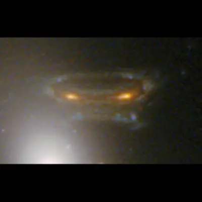 Gravitationally Lensed Image of Distant Galaxy in Abell 68