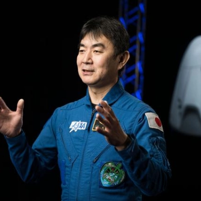 JAXA astronaut Kimiya Yui is photographed during an interview